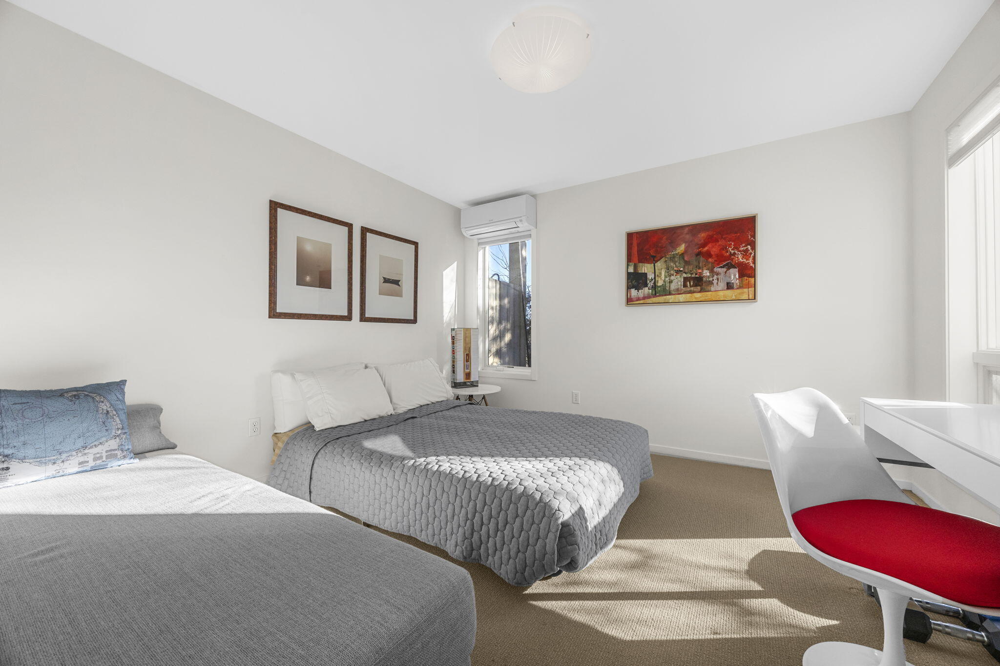 9 Thistlemore Road Provincetown, MA 02657 - Photo 24 of 36 a bedroom with two beds and a chair