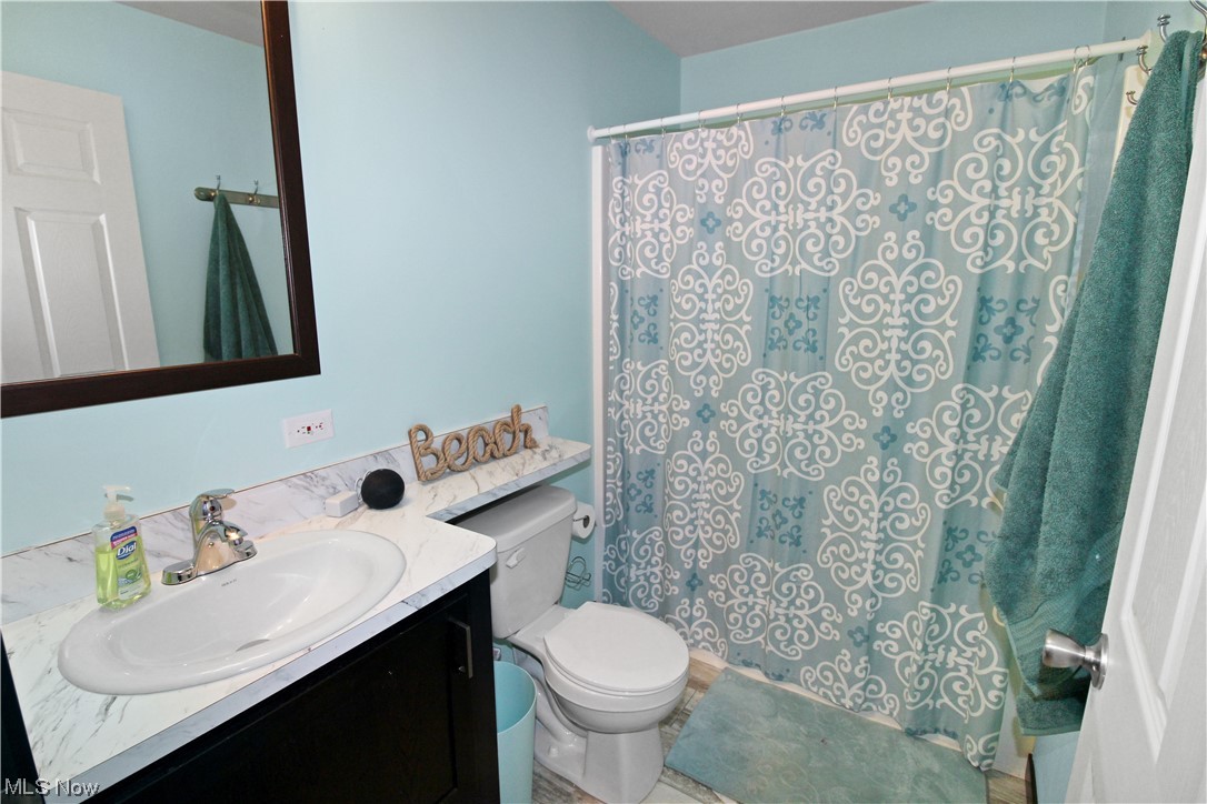 1609 Coldwater Crossing Road Lakeside Marblehead, OH 43440 - Photo 5 of 38 Bathroom featuring vanity and toilet