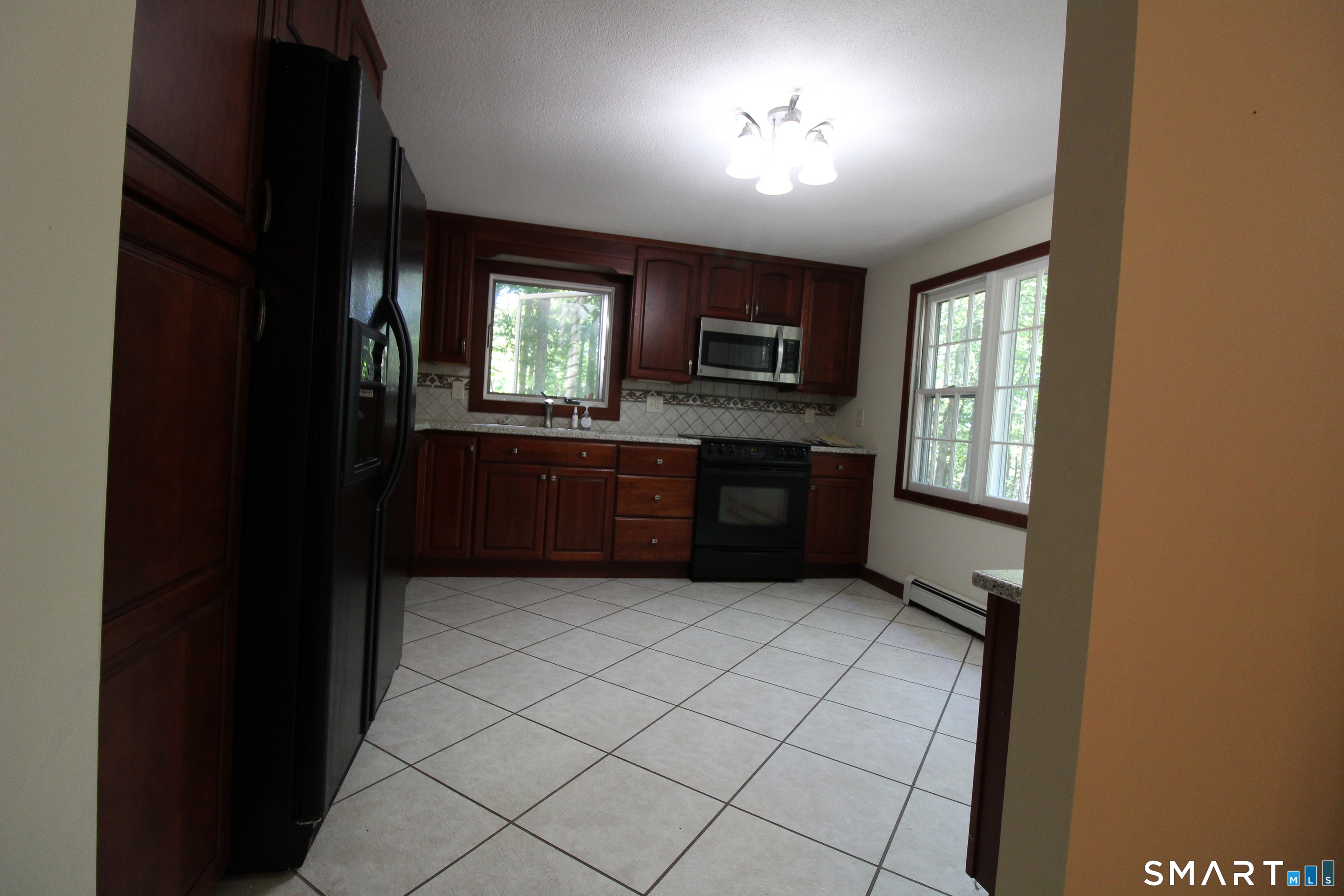 67 Mulberry Road Mansfield, CT 06250 - Photo 5 of 27 Lots of natural light in thespacious kitchen