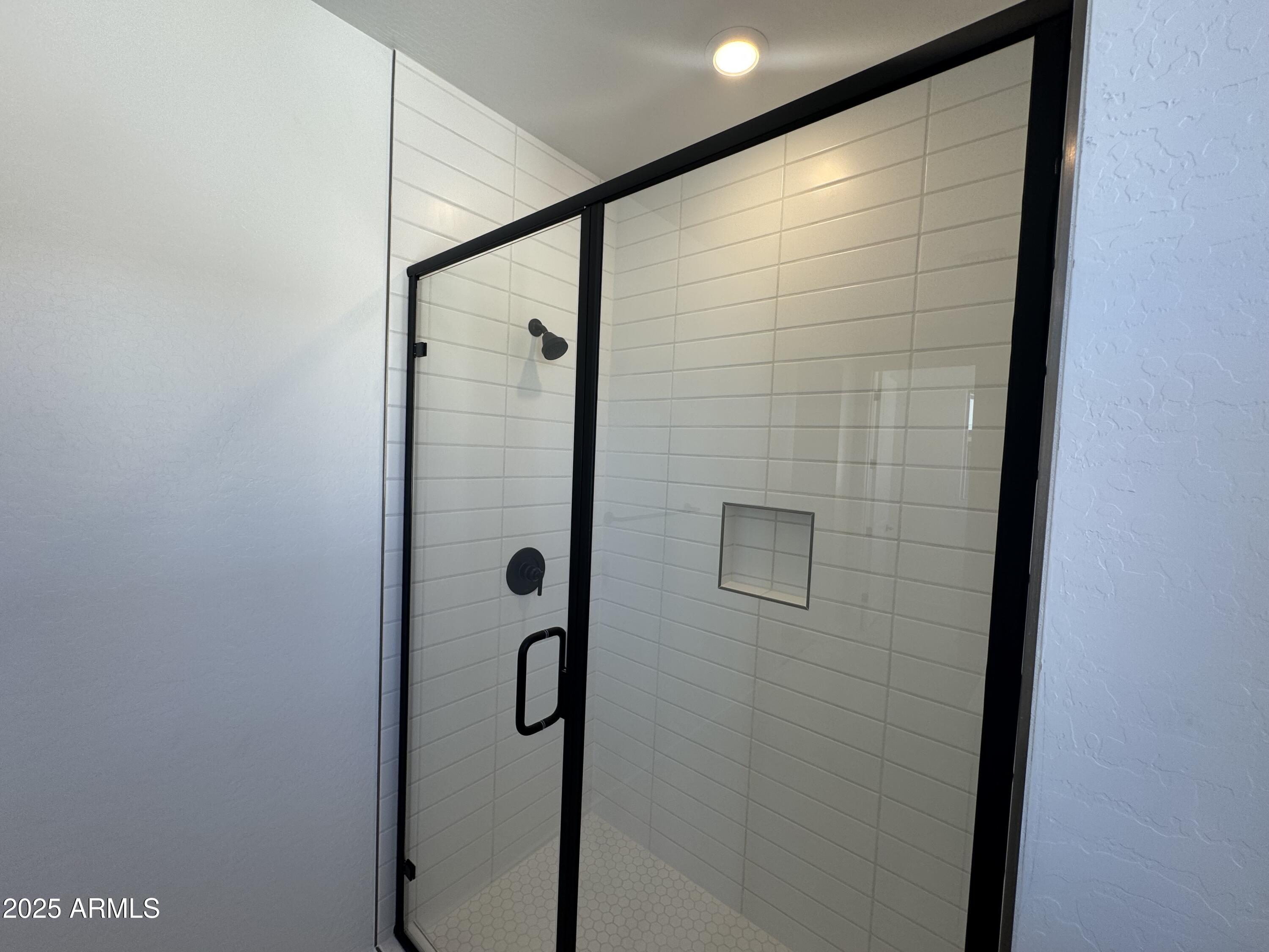 2454 West Maximo Way Phoenix, AZ 85085 - Photo 13 of 27 a bathroom with a shower