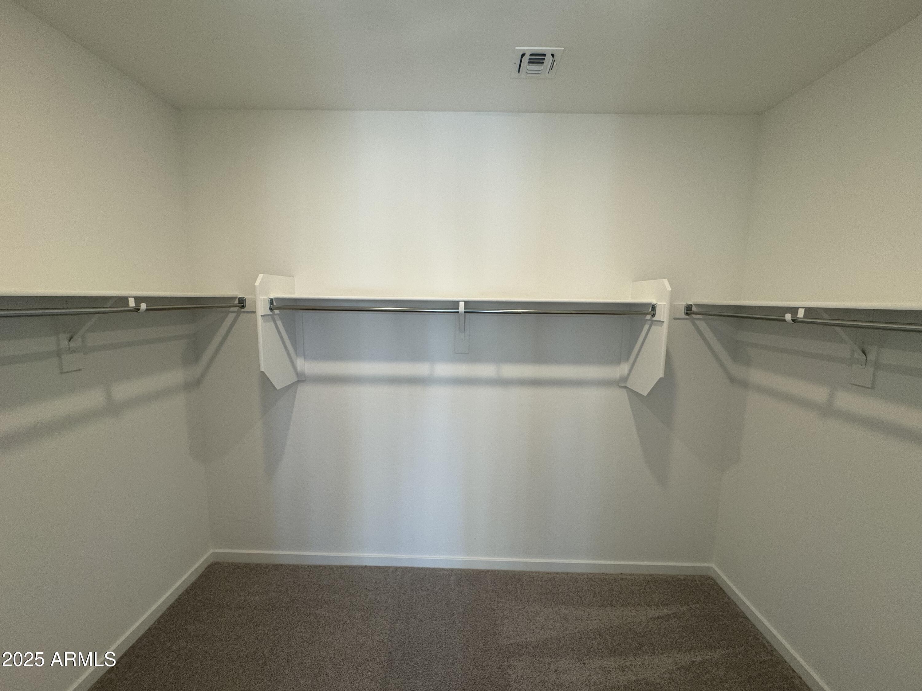 2454 West Maximo Way Phoenix, AZ 85085 - Photo 15 of 27 a view of an empty walk in closet