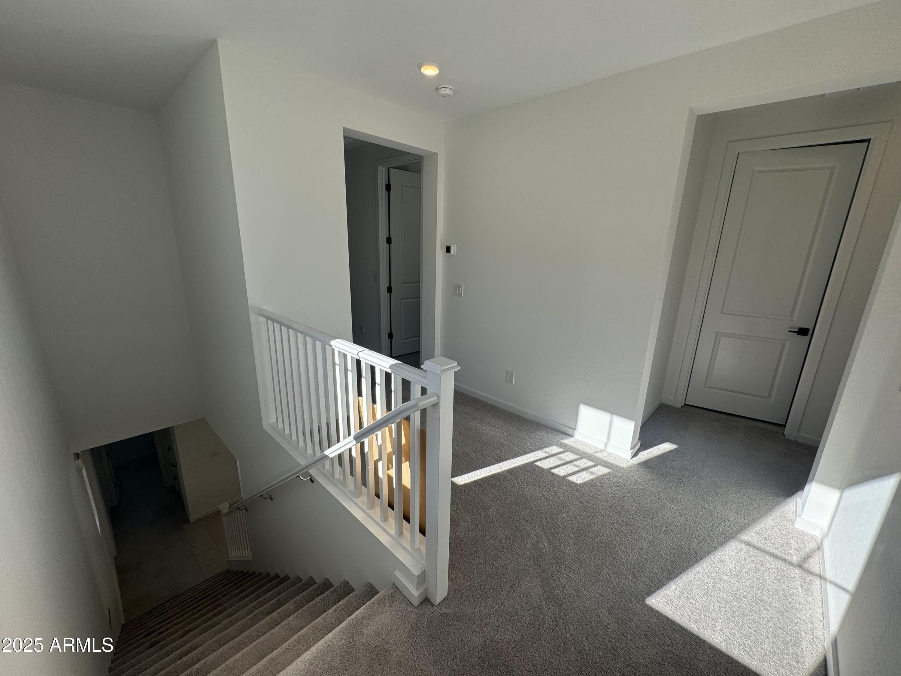 2454 West Maximo Way Phoenix, AZ 85085 - Photo 7 of 27 a view of entryway with wooden floor