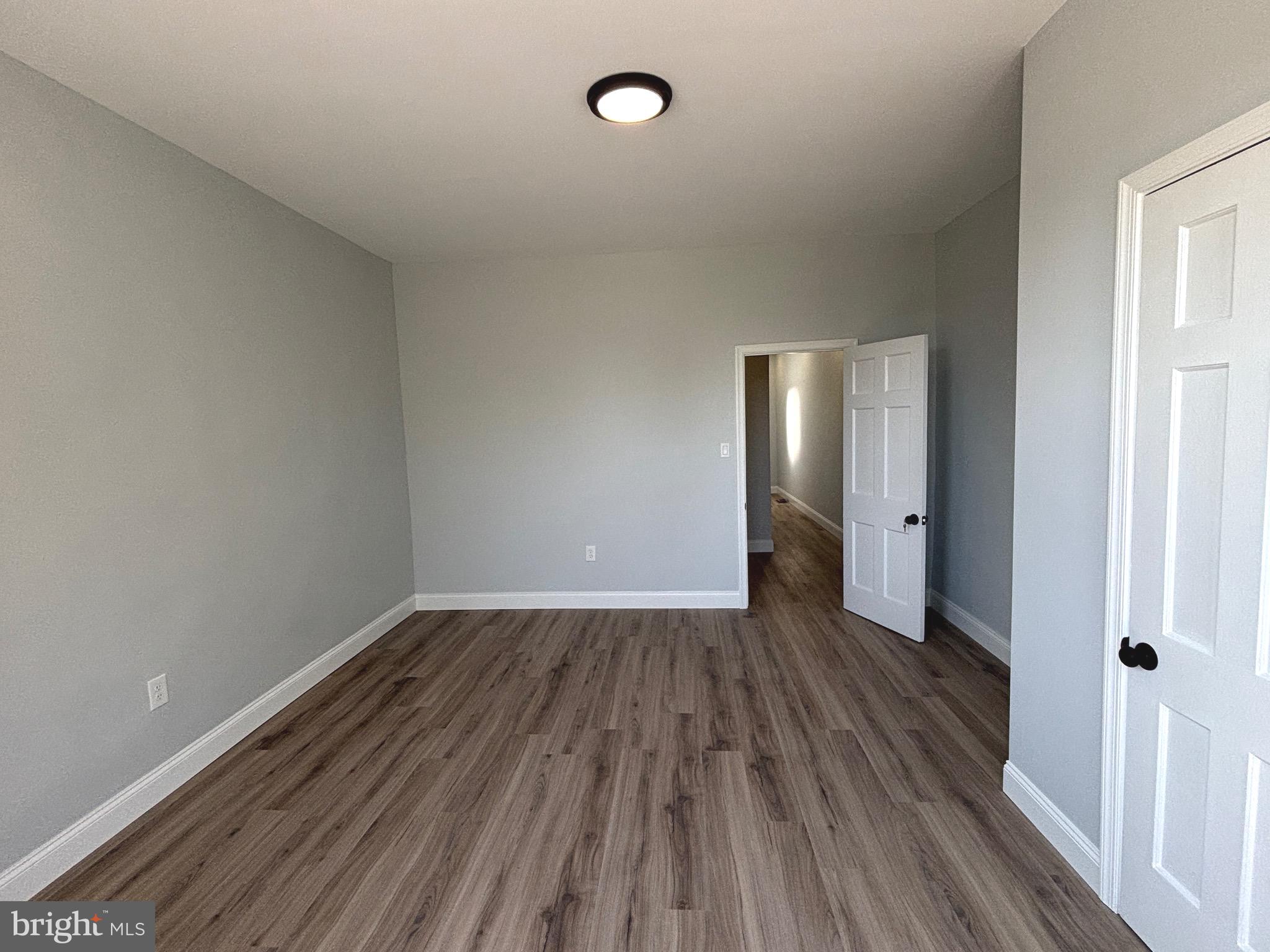 2636 Harford Road Baltimore, MD 21218 - Photo 14 of 18 a view of a room with wooden floor