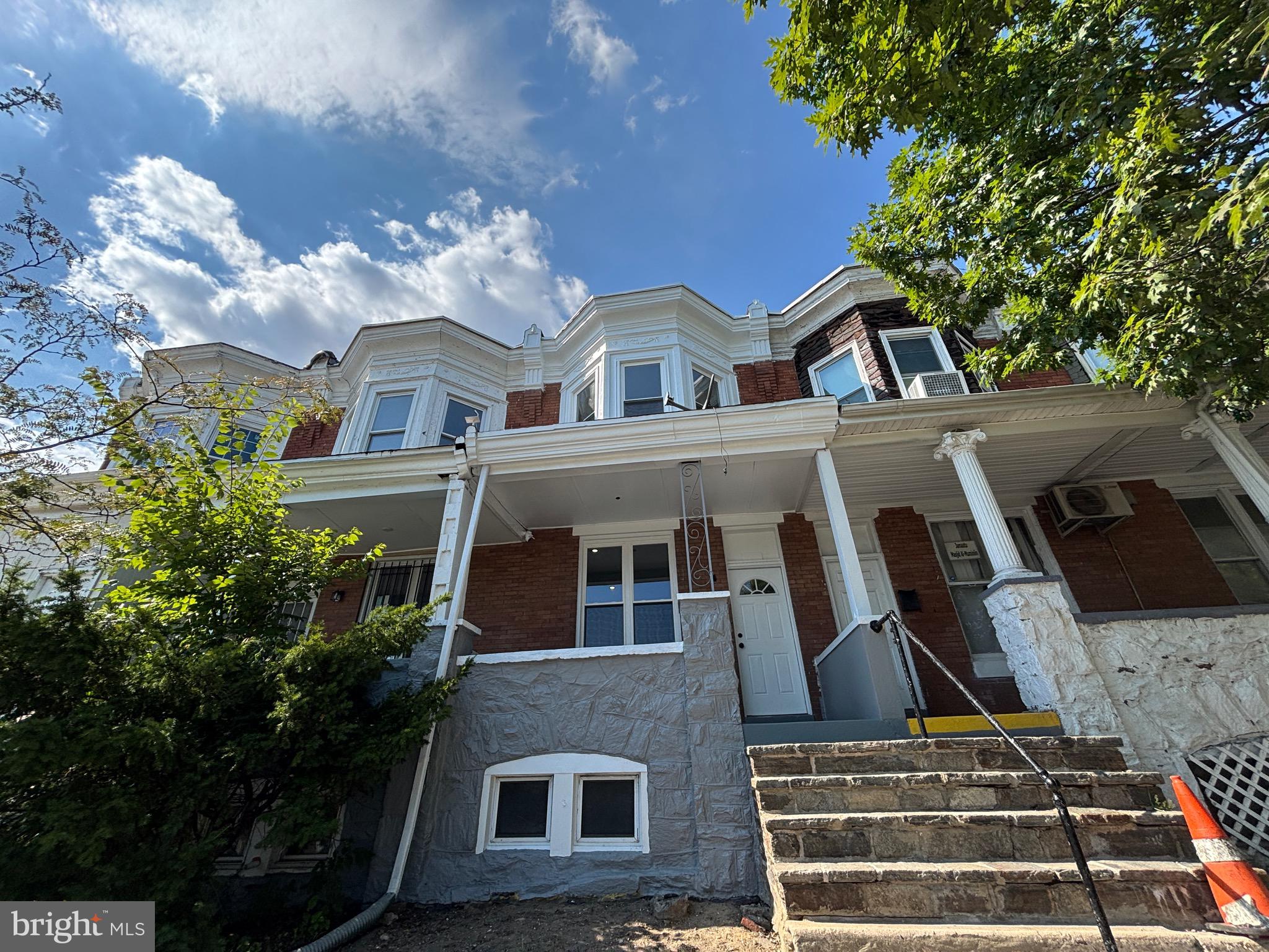 2636 Harford Road Baltimore, MD 21218 - Photo 2 of 18 a front view of a house with a yard