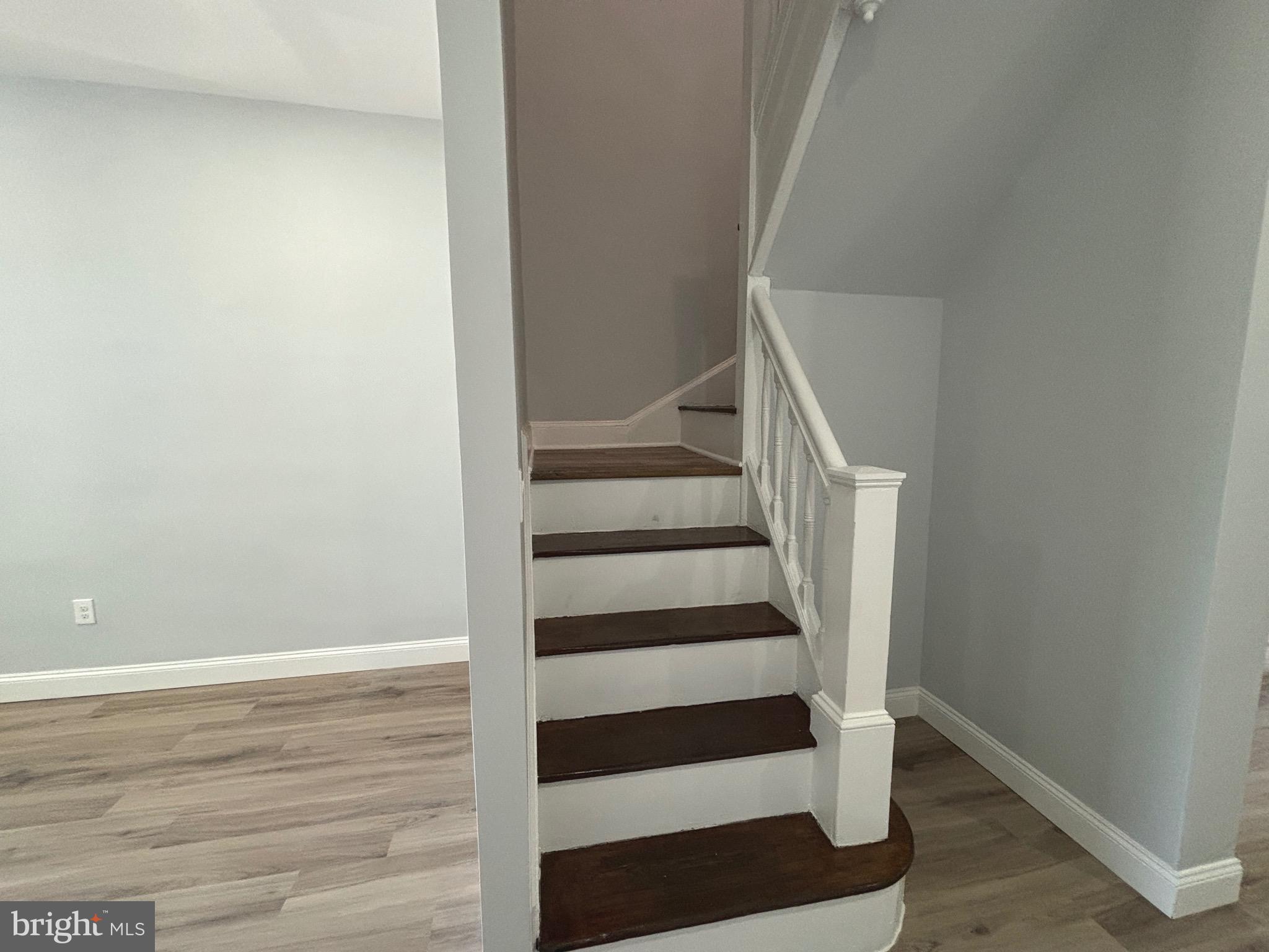 2636 Harford Road Baltimore, MD 21218 - Photo 10 of 18 a view of entryway with wooden floor and white walls