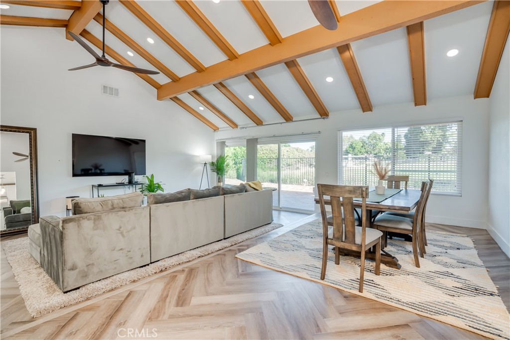 1450 Vía Vallarta Riverside, CA 92506 - Photo 11 of 36 a view of a livingroom with furniture and a flat screen tv