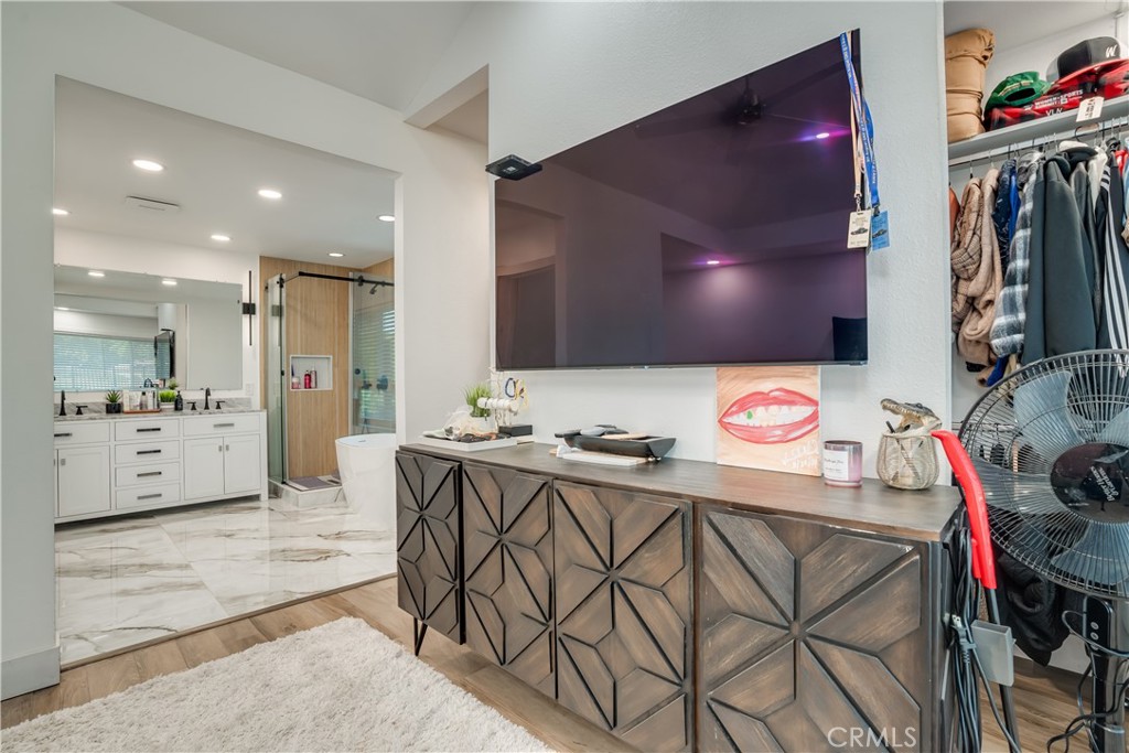 1450 Vía Vallarta Riverside, CA 92506 - Photo 24 of 36 a kitchen with stainless steel appliances kitchen island granite countertop a sink and cabinets