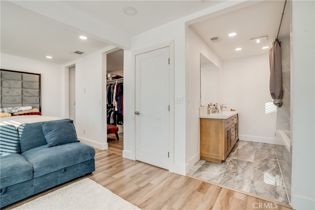 1450 Vía Vallarta Riverside, CA 92506 - Photo 28 of 36 a living room with furniture and kitchen view