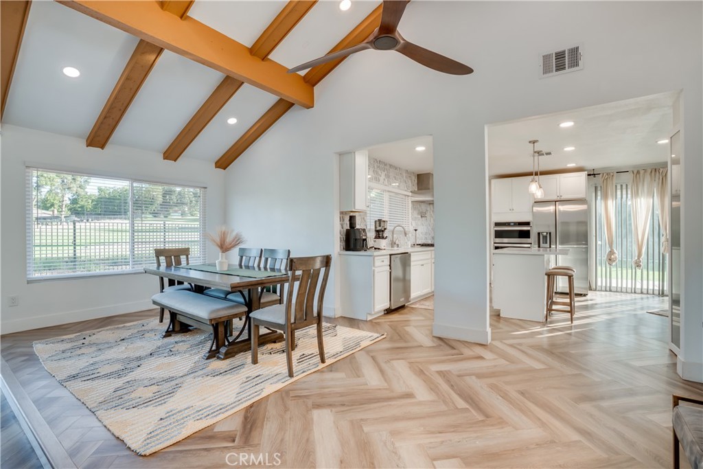 1450 Vía Vallarta Riverside, CA 92506 - Photo 10 of 36 a dining room with a table and chairs