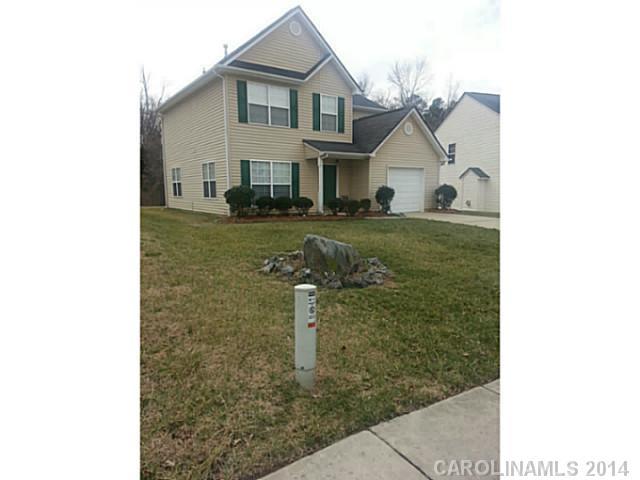 911 Reigate Road Charlotte, NC 28262 - Photo 3 of 14 a view of a house with a yard