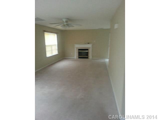 911 Reigate Road Charlotte, NC 28262 - Photo 6 of 14 a view of a livingroom with a fireplace