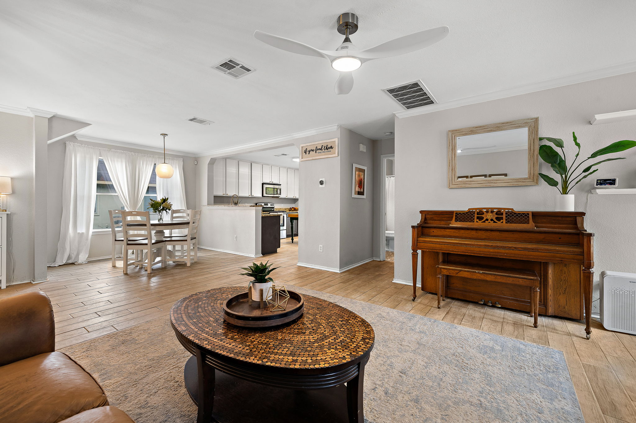 107 Easy Street Hutto, TX 78634 - Photo 13 of 34 a living room with furniture and wooden floor