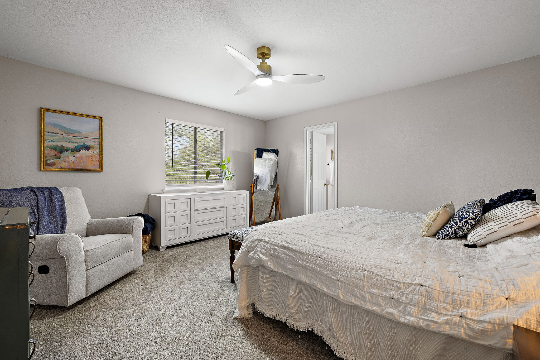 107 Easy Street Hutto, TX 78634 - Photo 18 of 34 a bedroom with bed and window