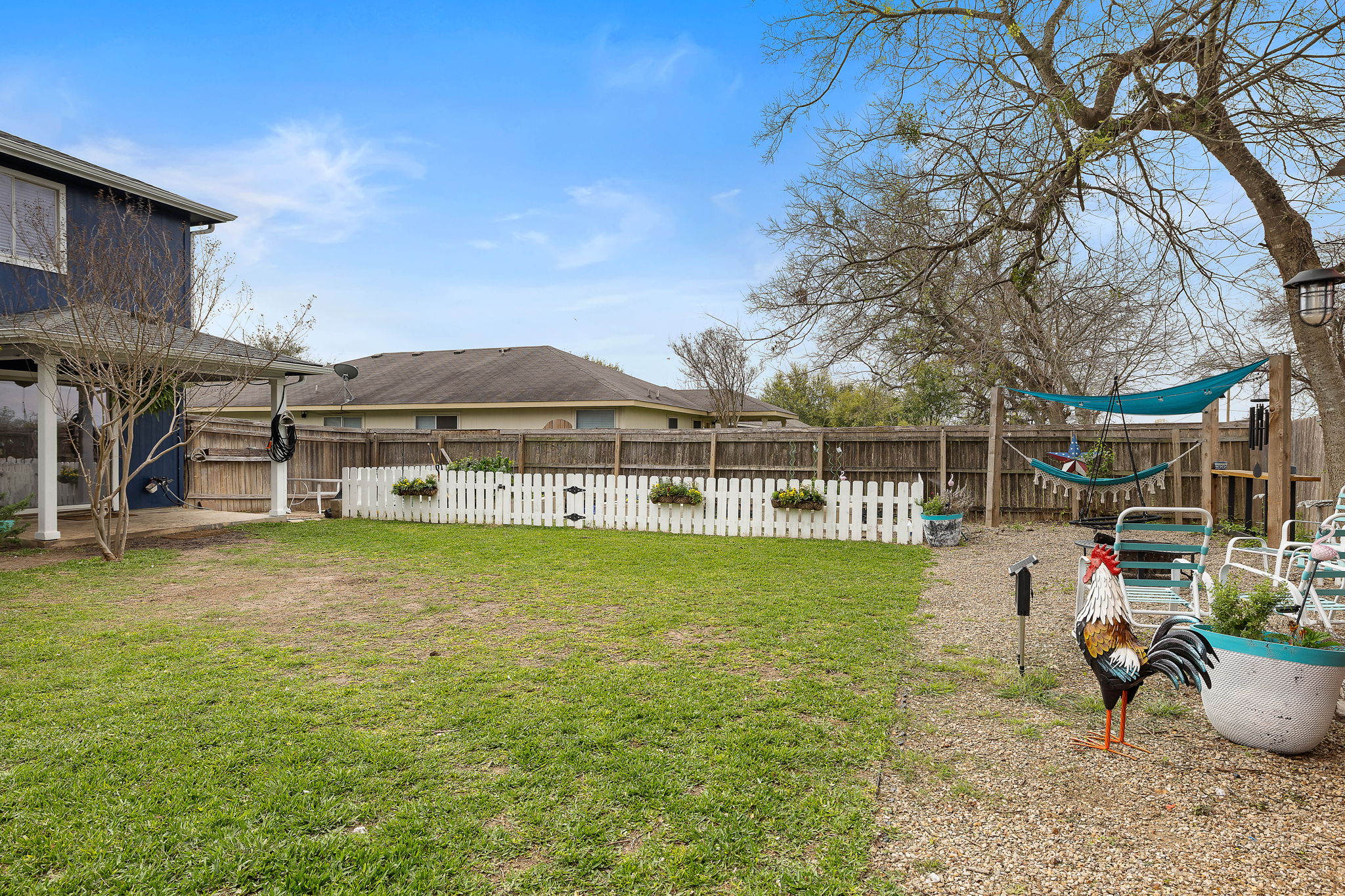 107 Easy Street Hutto, TX 78634 - Photo 29 of 34 a view of a house with backyard and sitting area