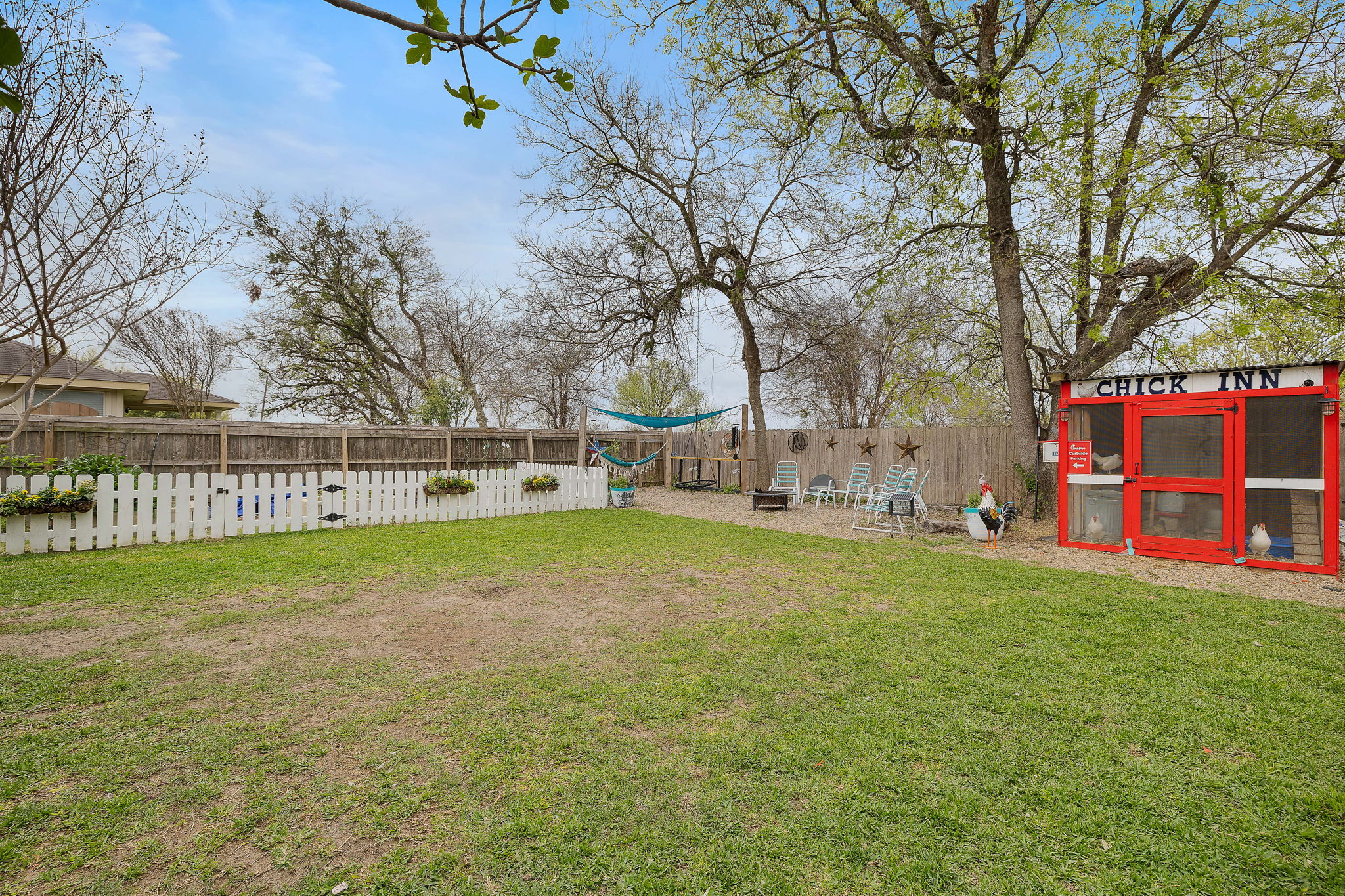 107 Easy Street Hutto, TX 78634 - Photo 31 of 34 a view of outdoor space with garden and trees