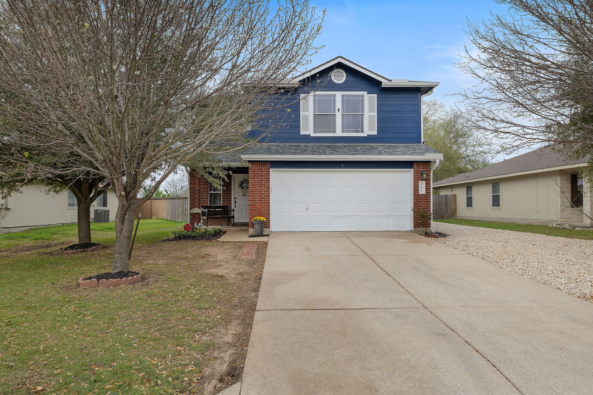 107 Easy Street Hutto, TX 78634 - Photo 34 of 34 a front view of a house with a yard