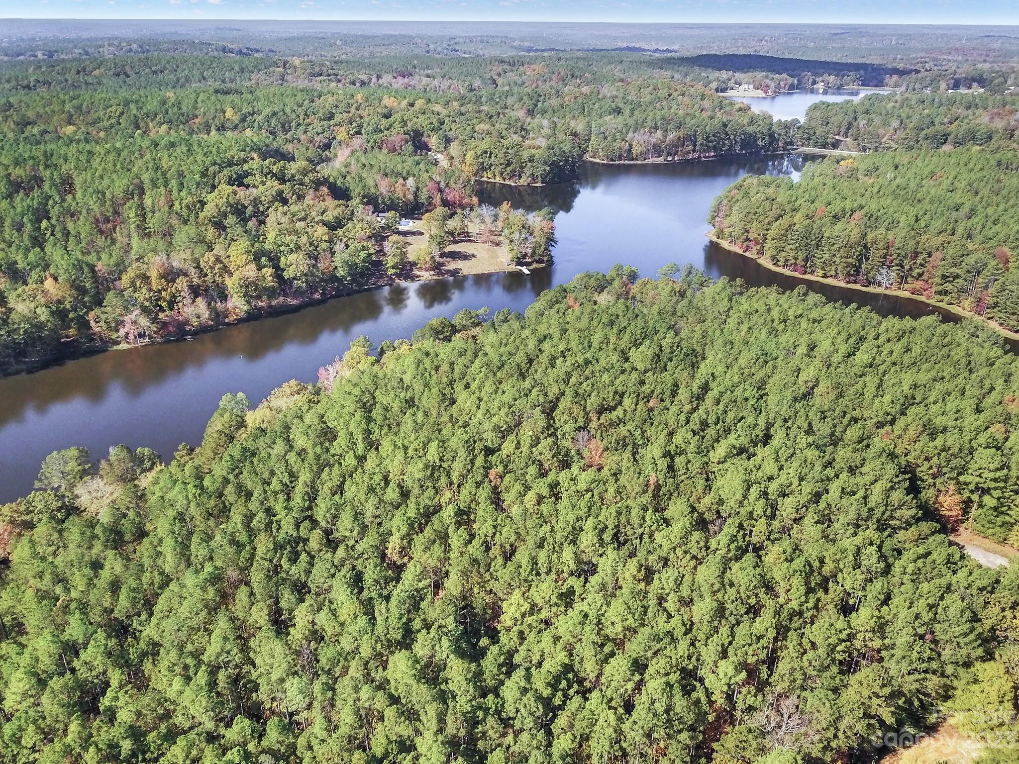 Lot 22 Mountain Lakes Road Chester, SC 29706 - Photo 9 of 20 a view of a lake with a mountain in the background