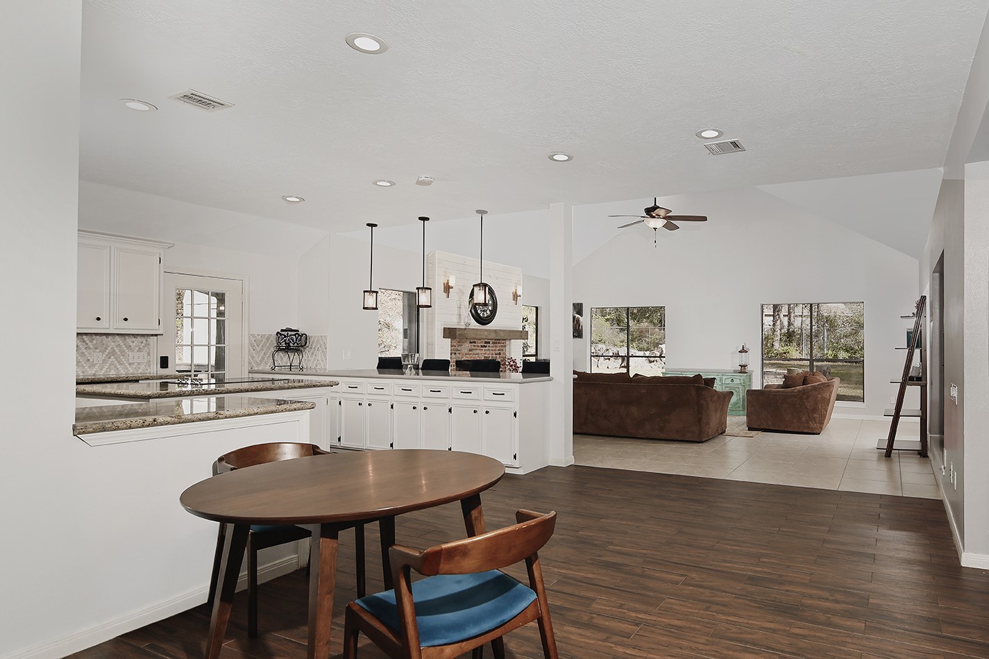 44 Lake Forest Circle Conroe, TX 77384 - Photo 6 of 45 a living room with furniture and a table