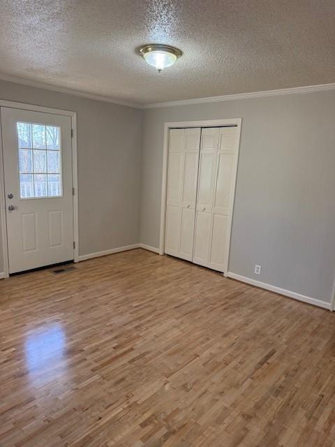 120 Dan Cheri Drive Calhoun, GA 30701 - Photo 2 of 14 a view of an empty room with wooden floor and a window
