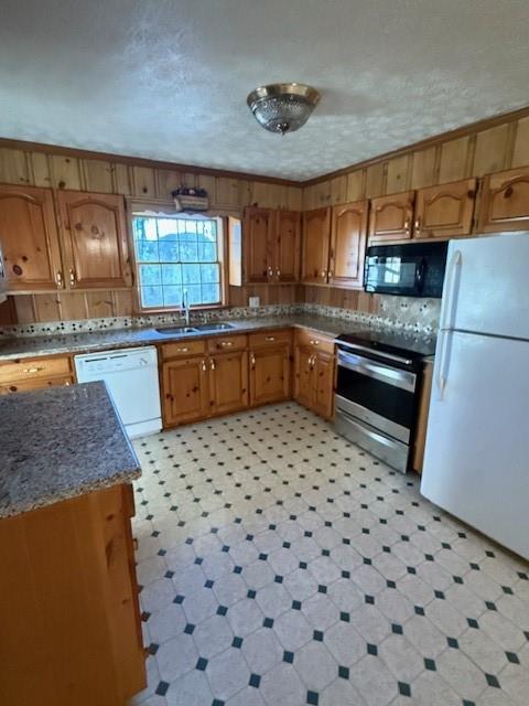 120 Dan Cheri Drive Calhoun, GA 30701 - Photo 3 of 14 a kitchen with a sink a stove top oven a sink and dishwasher