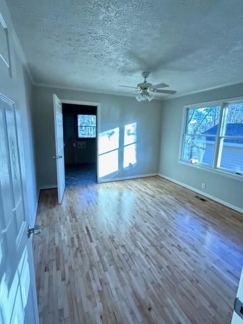 120 Dan Cheri Drive Calhoun, GA 30701 - Photo 4 of 14 wooden floor in an empty room with a window