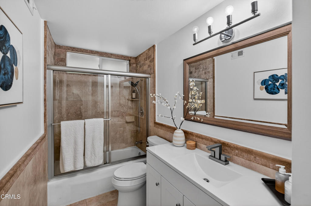 9325 La Shell Drive Tujunga, CA 91042 - Photo 23 of 46 a bathroom with a sink toilet and shower