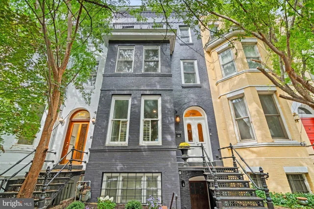 a front view of a multi story residential apartment building