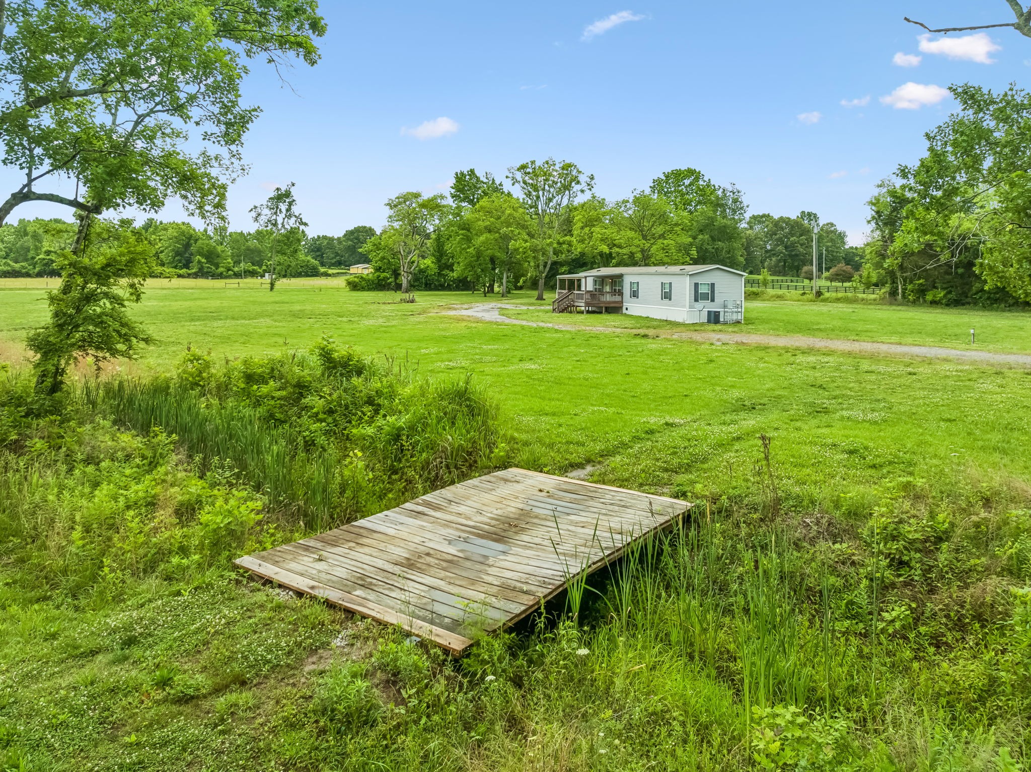 280 Kingdom Road Unionville, TN 37180 - Photo 17 of 65 a view of a mini house with a yard
