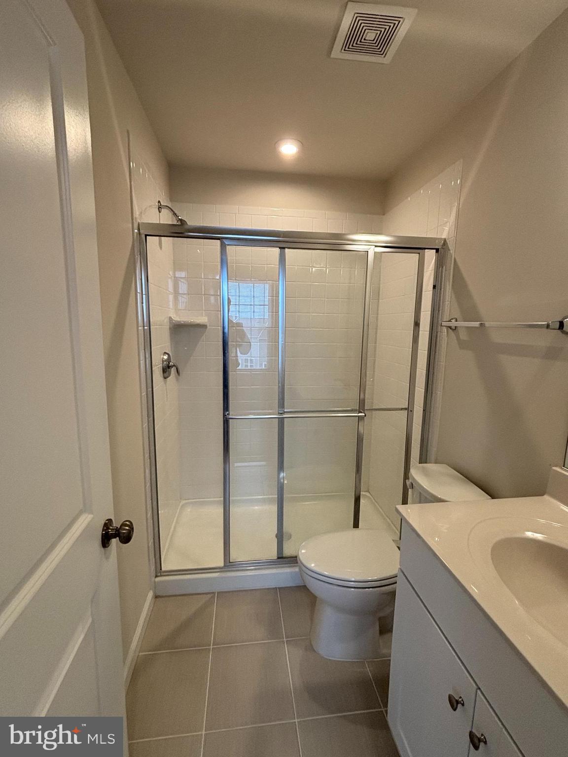 24 Anthem Street Ranson, WV 25438 - Photo 17 of 23 a bathroom with a toilet and a shower