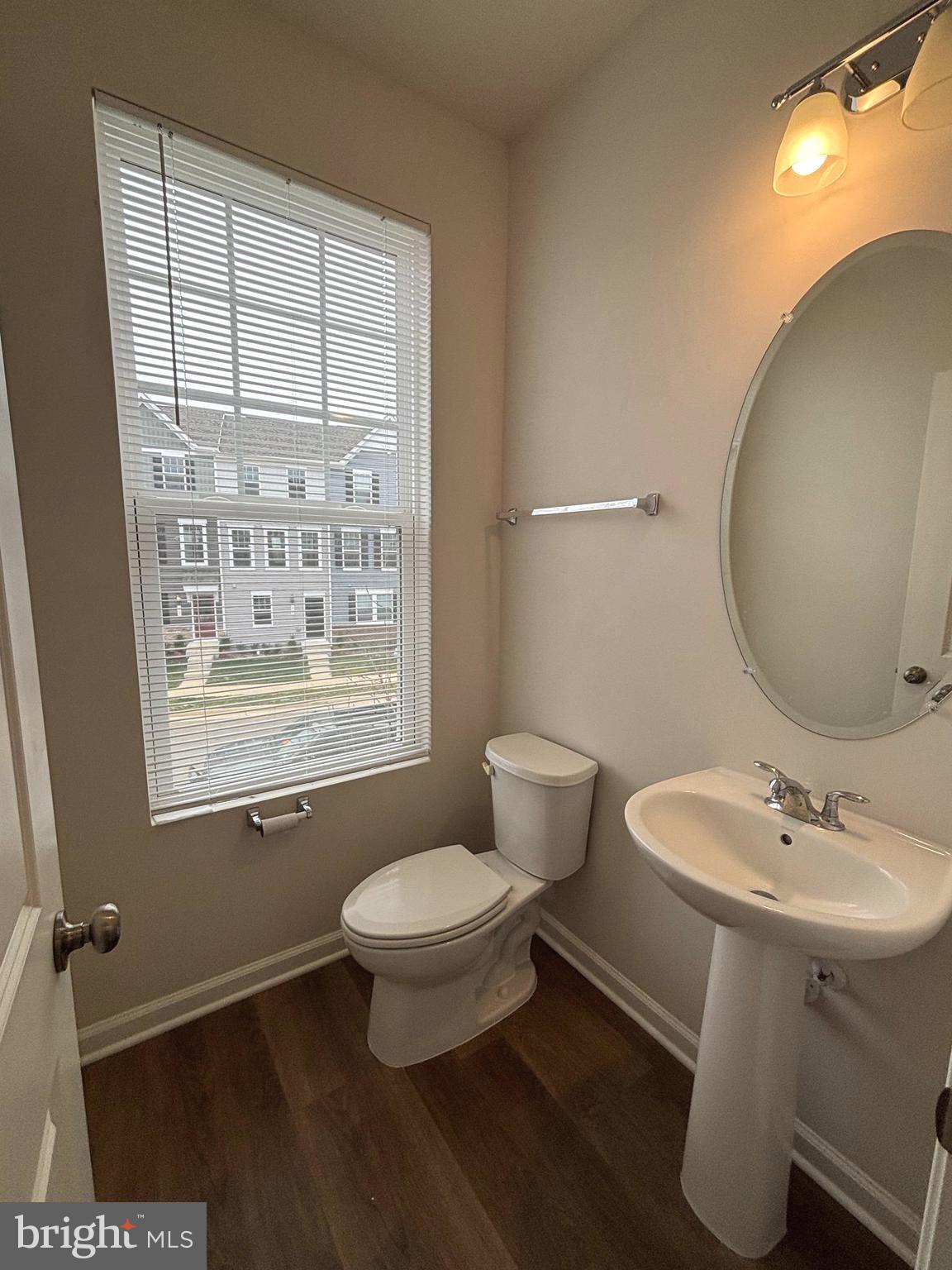 24 Anthem Street Ranson, WV 25438 - Photo 20 of 23 a bathroom with a sink toilet a mirror and shower