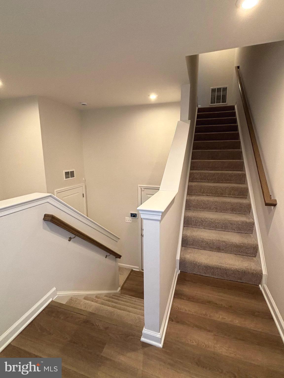 24 Anthem Street Ranson, WV 25438 - Photo 21 of 23 a view of entryway and hall with wooden floor