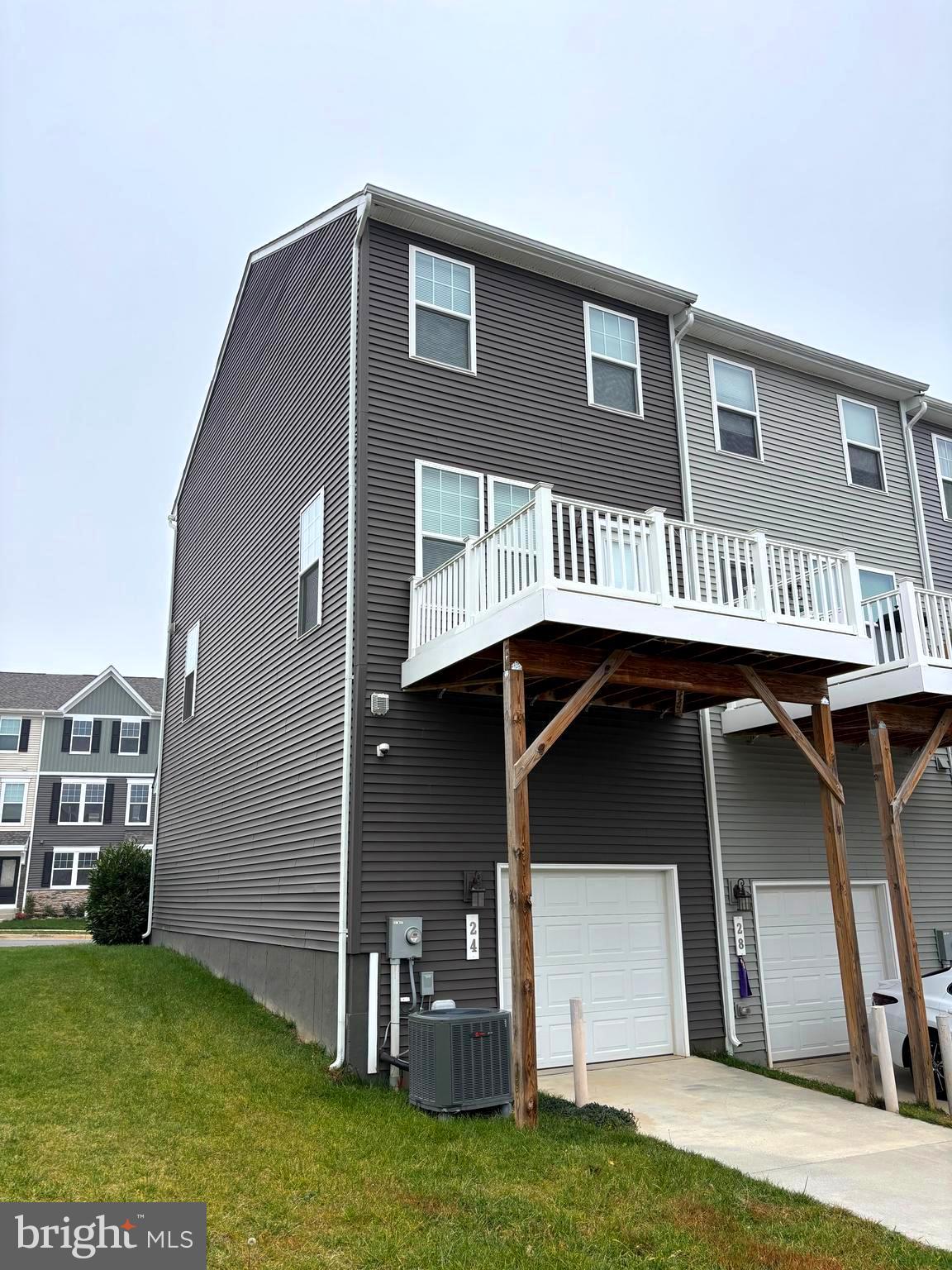 24 Anthem Street Ranson, WV 25438 - Photo 3 of 23 a front view of a house with garden