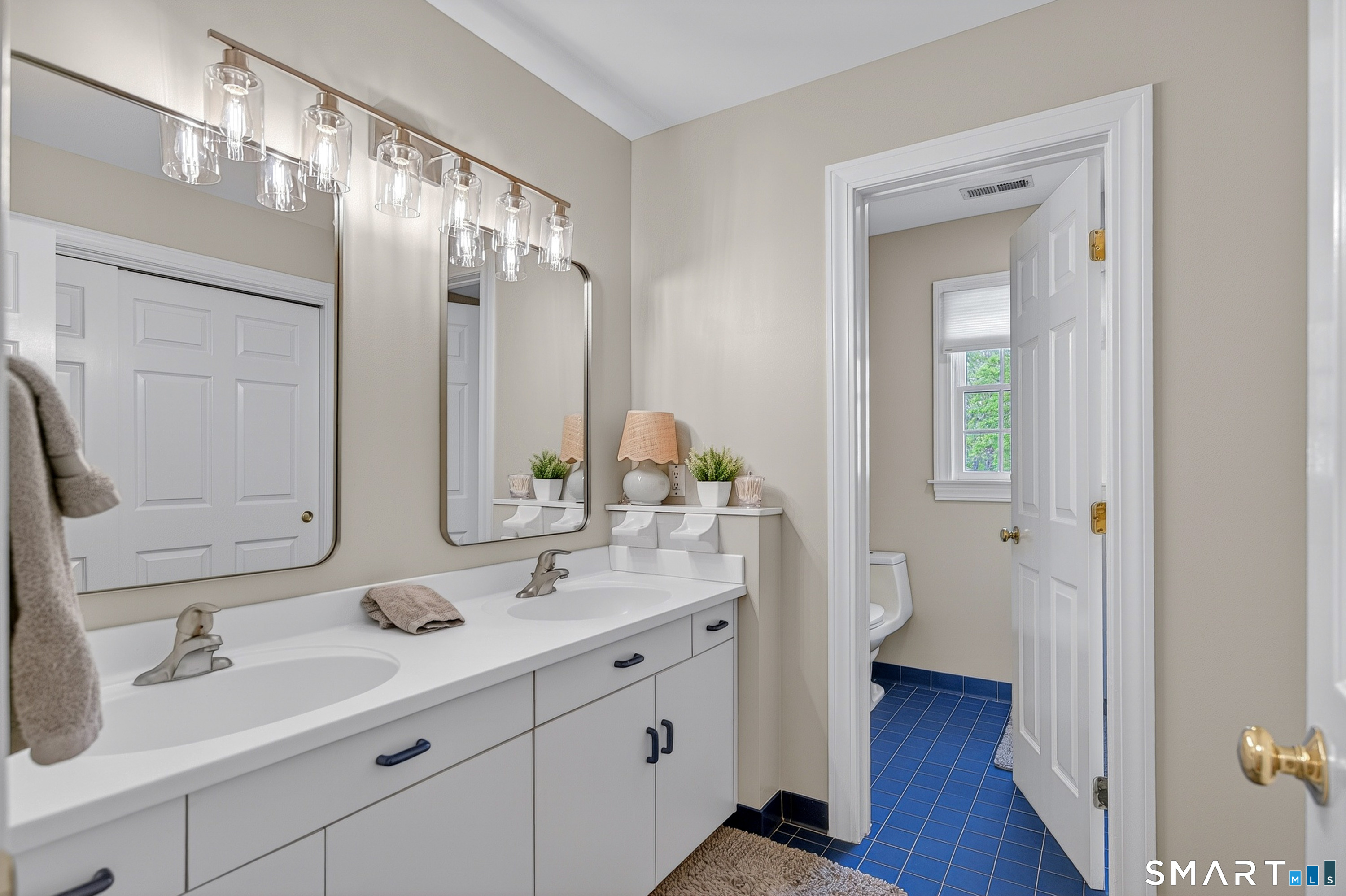 16 Farm Meadow Road Newtown, CT 06470 - Photo 23 of 40 a bathroom with a double vanity sink mirror and double