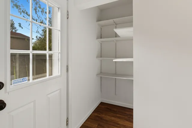 a view of small space with racks on the wall