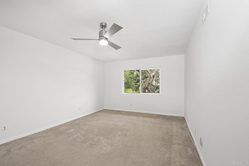 1671 James Drive Carlsbad, CA 92008 - Photo 31 of 41 an empty room with windows