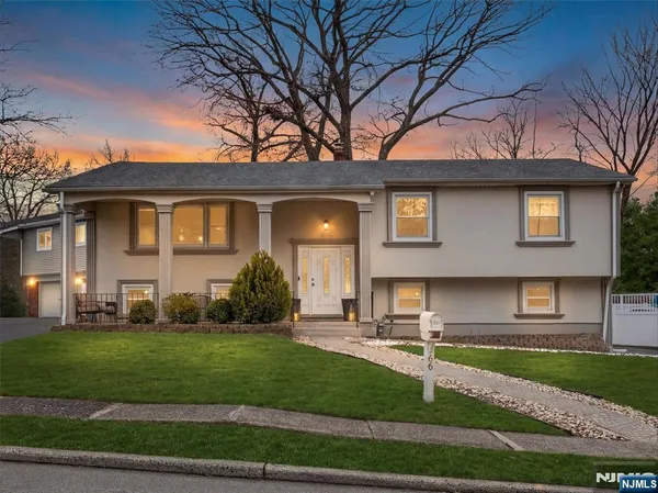 a view of a yard in front of a house