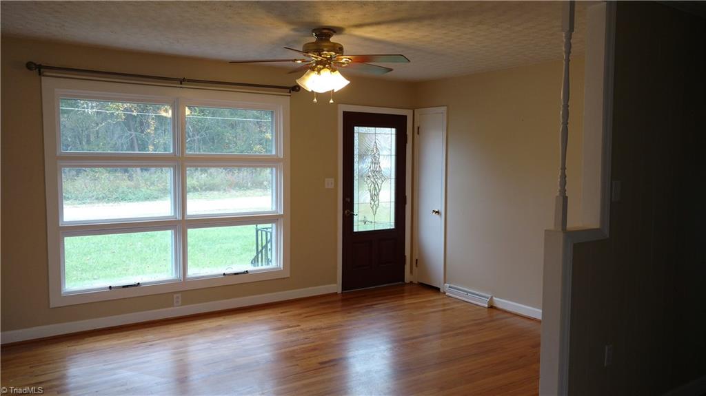 4835 Reid Road Winston-Salem, NC 27107 - Photo 3 of 10 Living Room with Hardwood floors and great natural light!