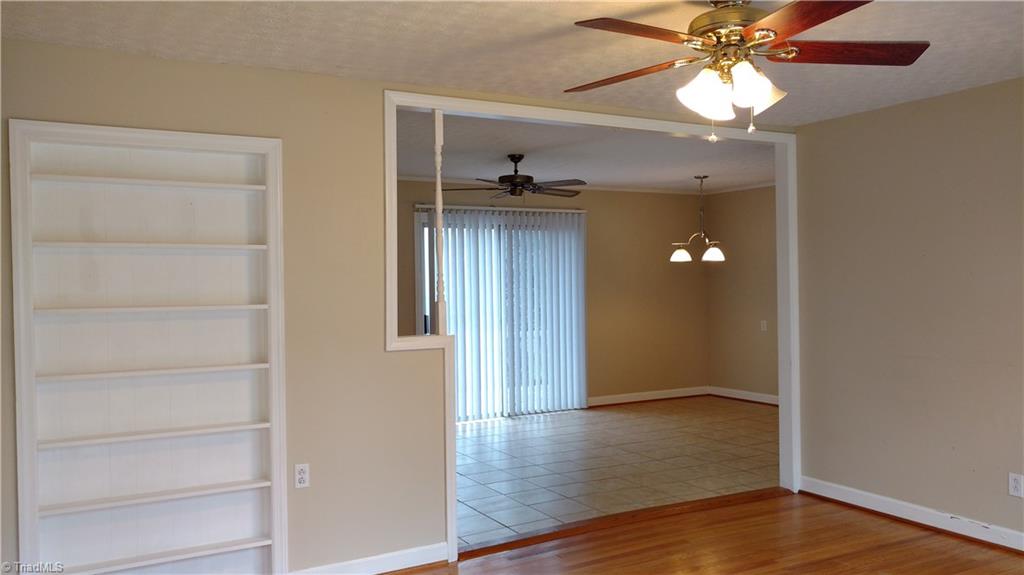 4835 Reid Road Winston-Salem, NC 27107 - Photo 10 of 10 Built-in shelves in the living room! Nice open floor plan.