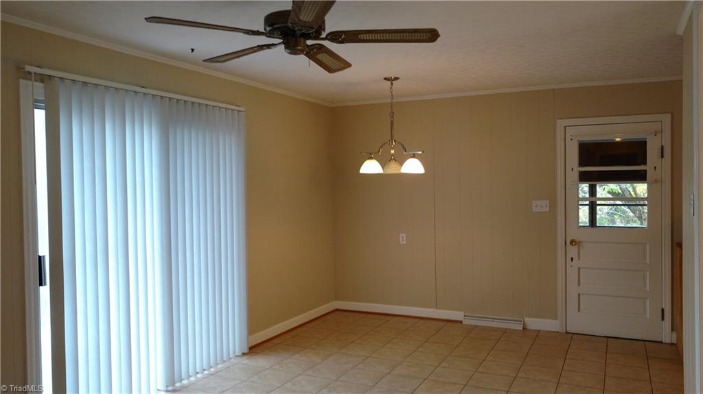 4835 Reid Road Winston-Salem, NC 27107 - Photo 7 of 10 Dining area with kitchen to the left.