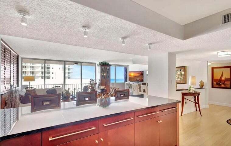 4200 North Ocean Drive, Unit 1905 Singer Island, FL 33404 - Photo 21 of 38 a kitchen with counter top space and living room