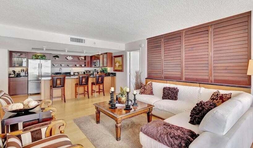4200 North Ocean Drive, Unit 1905 Singer Island, FL 33404 - Photo 24 of 38 a living room with furniture and wooden floor