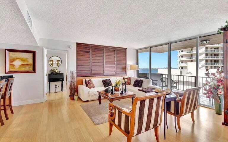 4200 North Ocean Drive, Unit 1905 Singer Island, FL 33404 - Photo 25 of 38 a living room with furniture and wooden floor