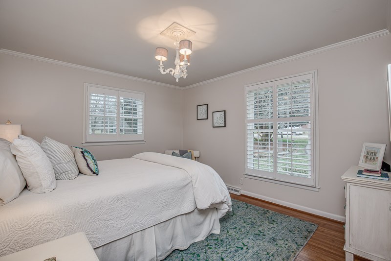 5911 Post Road Nashville, TN 37205 - Photo 17 of 38 a bedroom with a large bed and a window