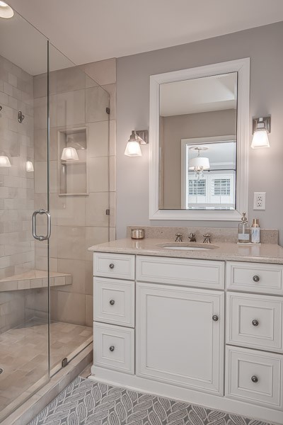 5911 Post Road Nashville, TN 37205 - Photo 21 of 38 a bathroom with a shower sink and mirror