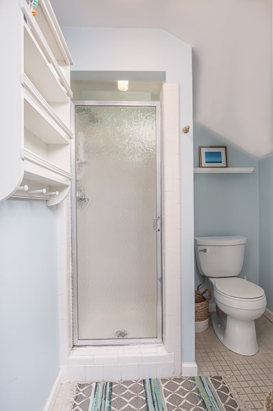 5911 Post Road Nashville, TN 37205 - Photo 26 of 38 a bathroom with a toilet and a glass door