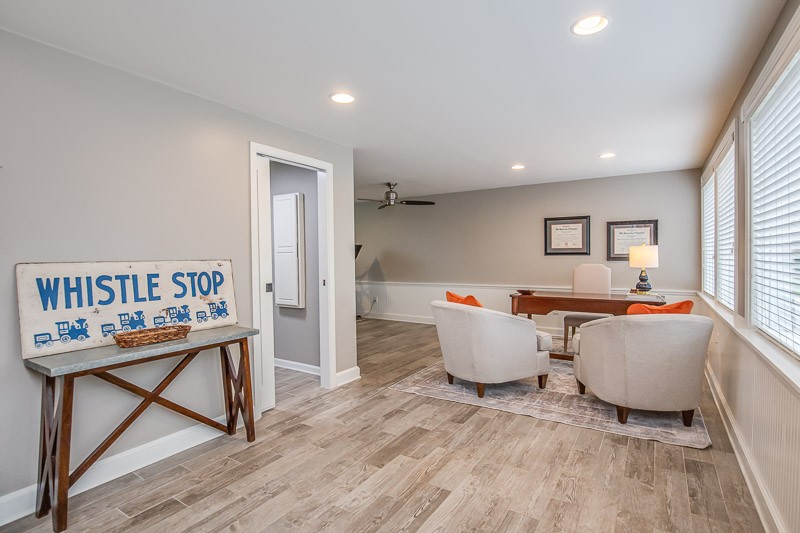 5911 Post Road Nashville, TN 37205 - Photo 28 of 38 a living room with furniture and a wooden floor