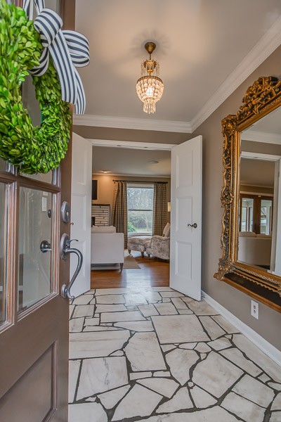 5911 Post Road Nashville, TN 37205 - Photo 3 of 38 a living room with furniture and a potted plant