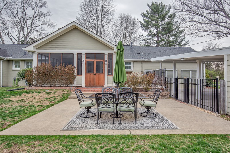 5911 Post Road Nashville, TN 37205 - Photo 38 of 38 a view of a house with backyard and a sitting area