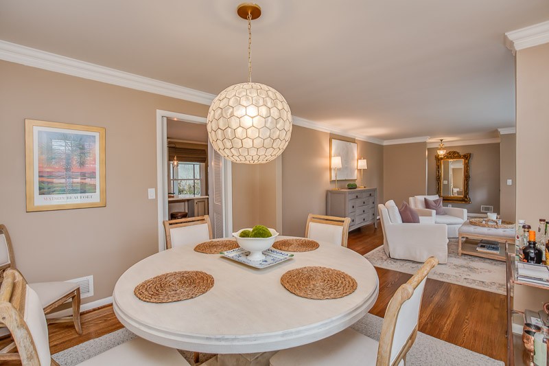 5911 Post Road Nashville, TN 37205 - Photo 7 of 38 a view of a dining room with furniture and chandelier