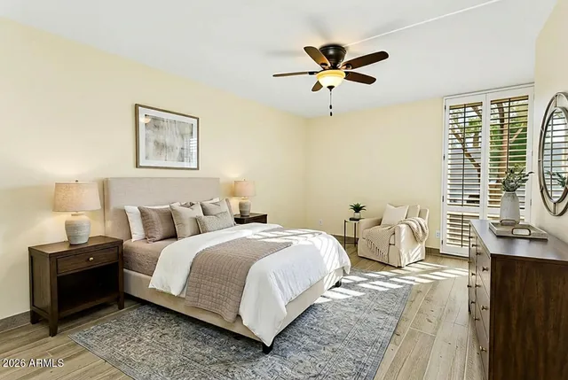 a view of a swimming pool with a lounge chairs